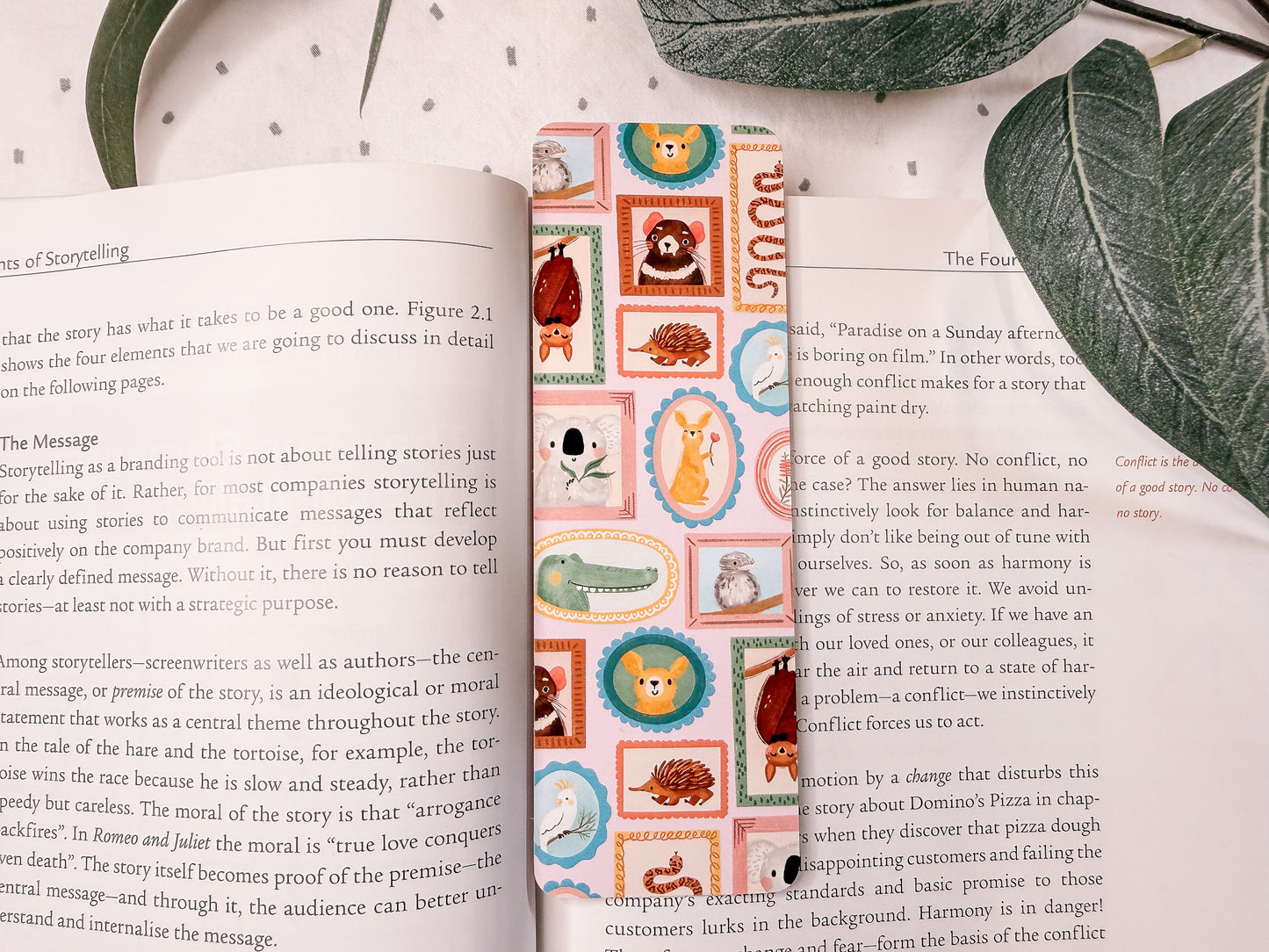 'aussie portraits' illustrated bookmark placed on a book