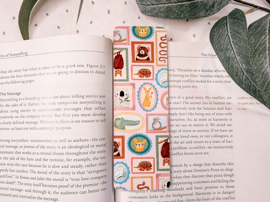 'aussie portraits' illustrated bookmark placed on a book