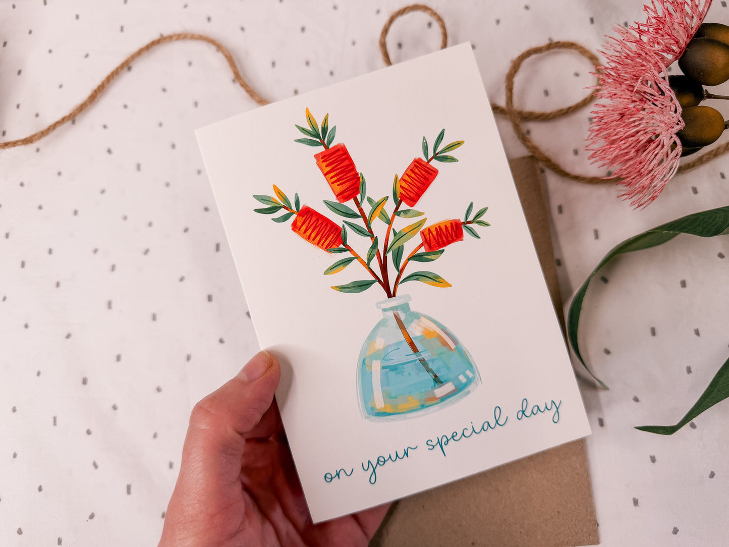 close up of hand drawn bottle brush greeting card
